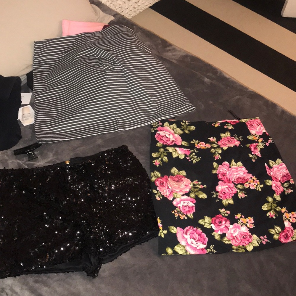 Black shorts and two skirts.
